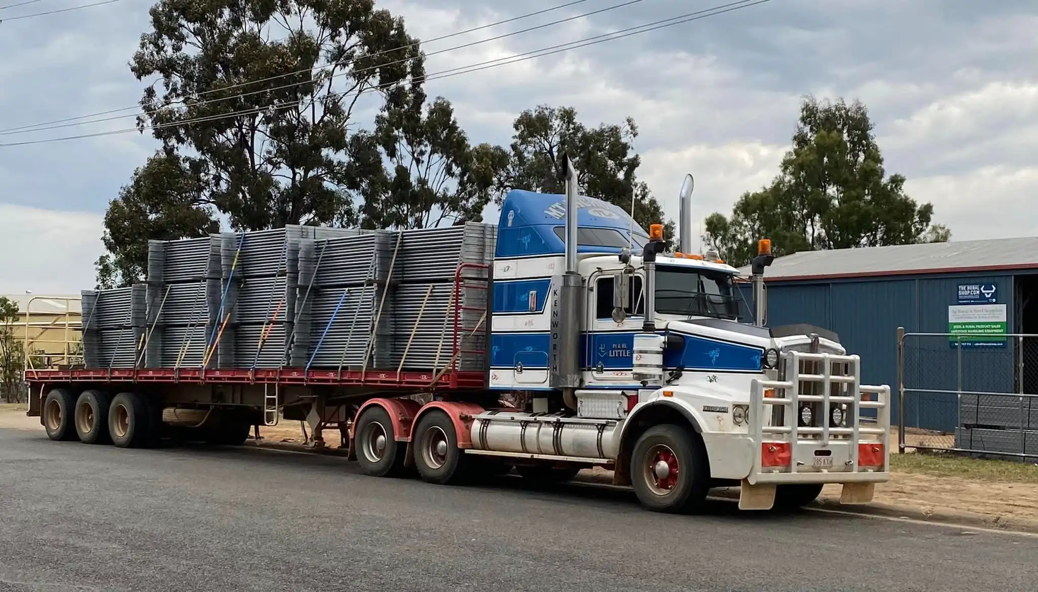 The Rural Shop.com Loaded Truck with cattle yard panels for delivery to a farm property